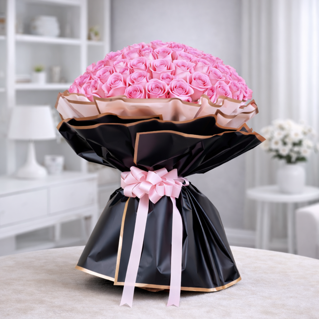 Luxury pink roses bouquet in premium black wrapping