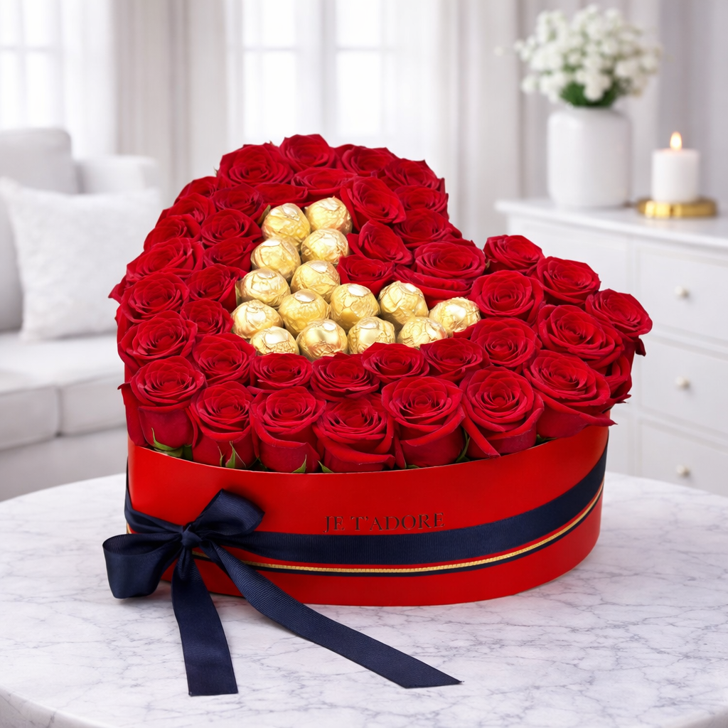 Luxury red roses heart arrangement with chocolate center gift