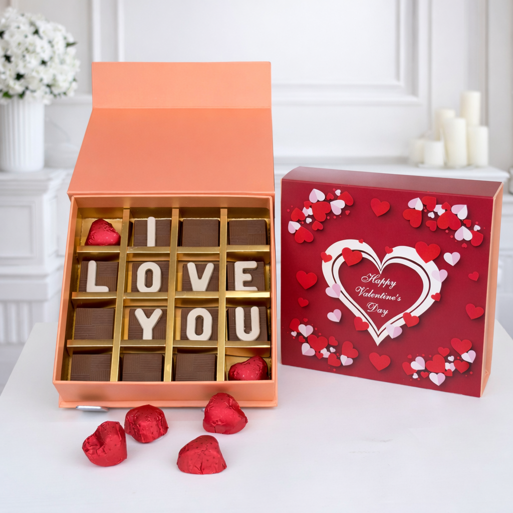 Valentine chocolate love box with greeting card and heart candies