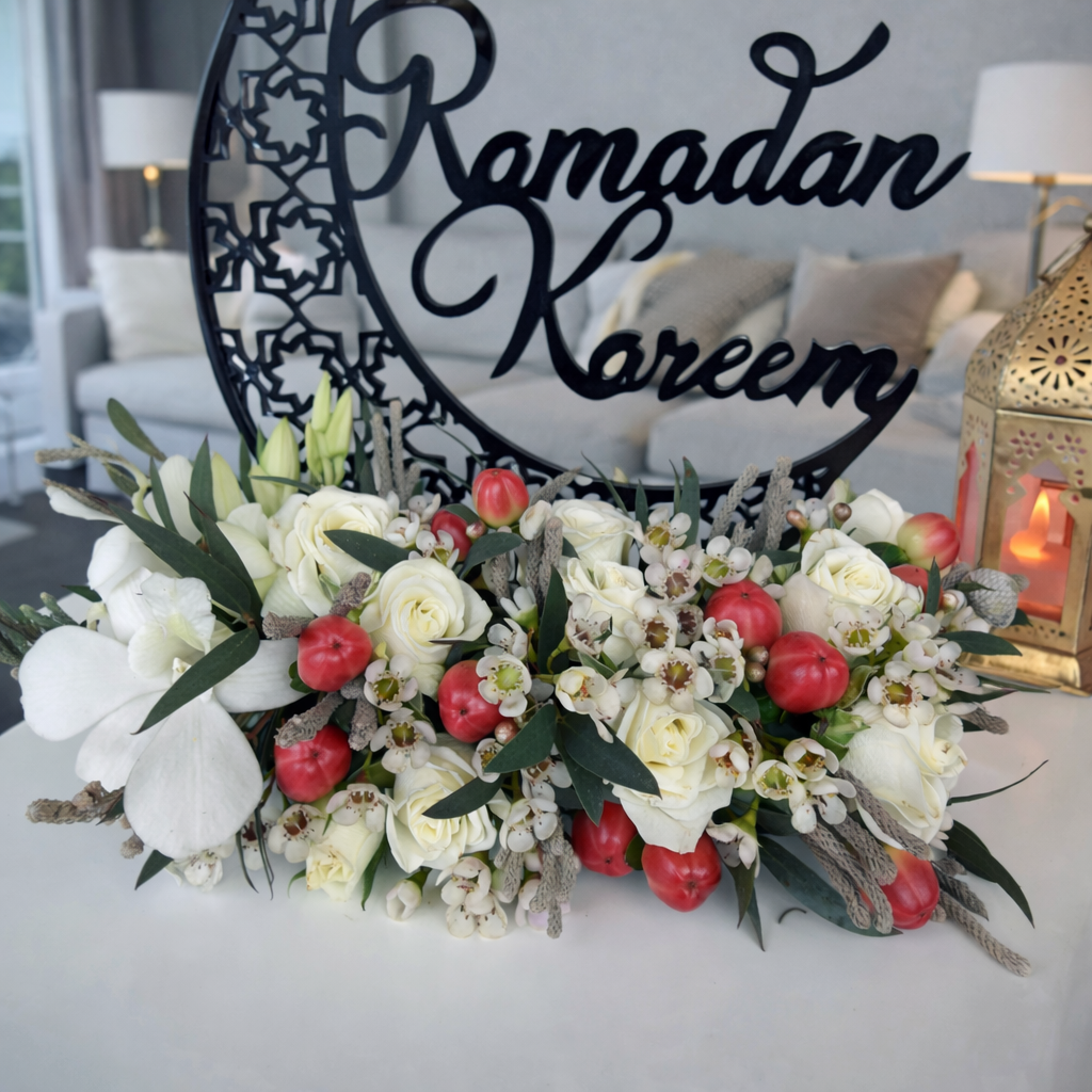 Elegant Ramadan Kareem centerpiece with white flowers and crescent decor