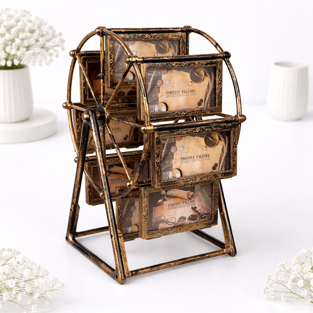 Vintage bronze ferris wheel rotating multi-photo frame holding six pictures, displayed on a white surface
