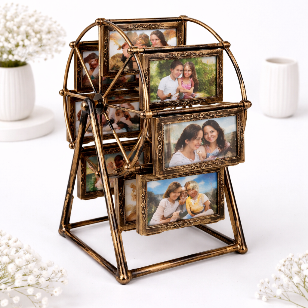 Vintage bronze ferris wheel photo frame displaying six family portrait photos, decorated with baby's breath flowers on a white surface