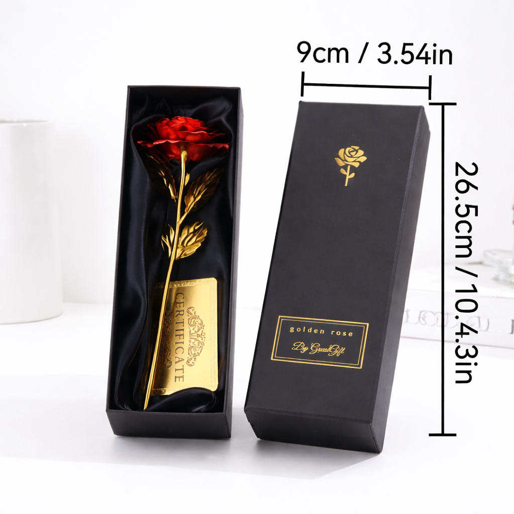 Red and gold artificial rose with certificate in a black satin-lined gift box, with box dimensions shown: 9cm × 26.5cm (3.54in × 10.43in).