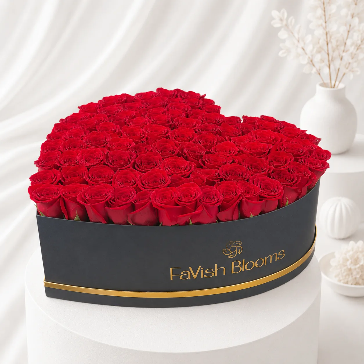 Red roses in luxury black heart-shaped box