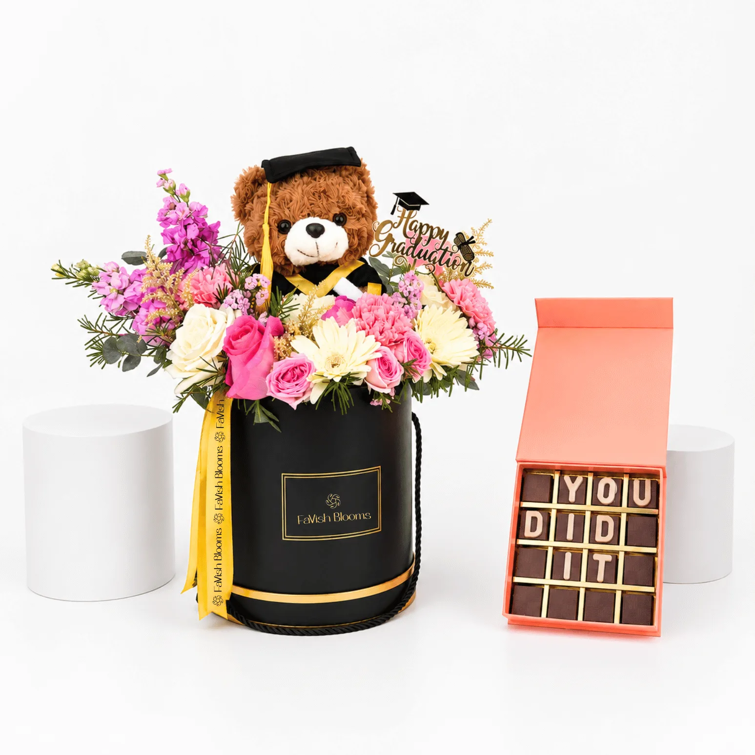 Graduation flower box with teddy bear and chocolate gift set.